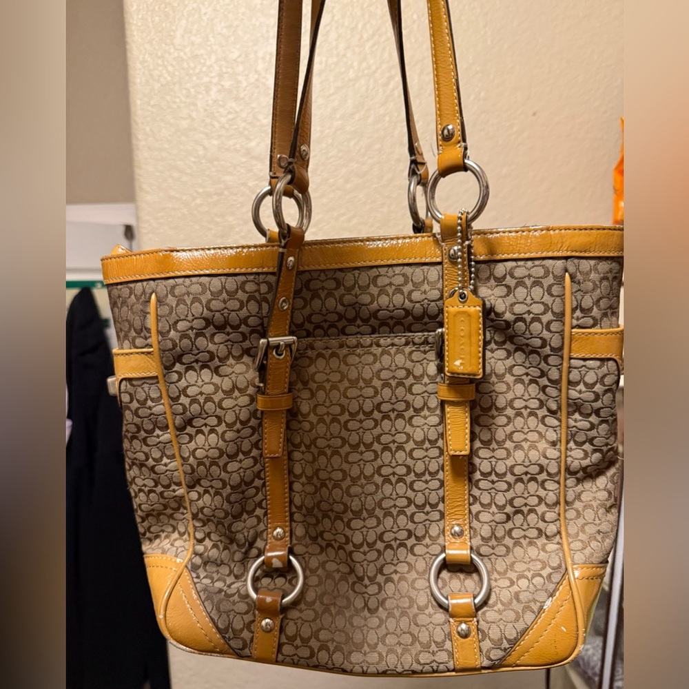 Stylish Tan and Brown Coach Handbag